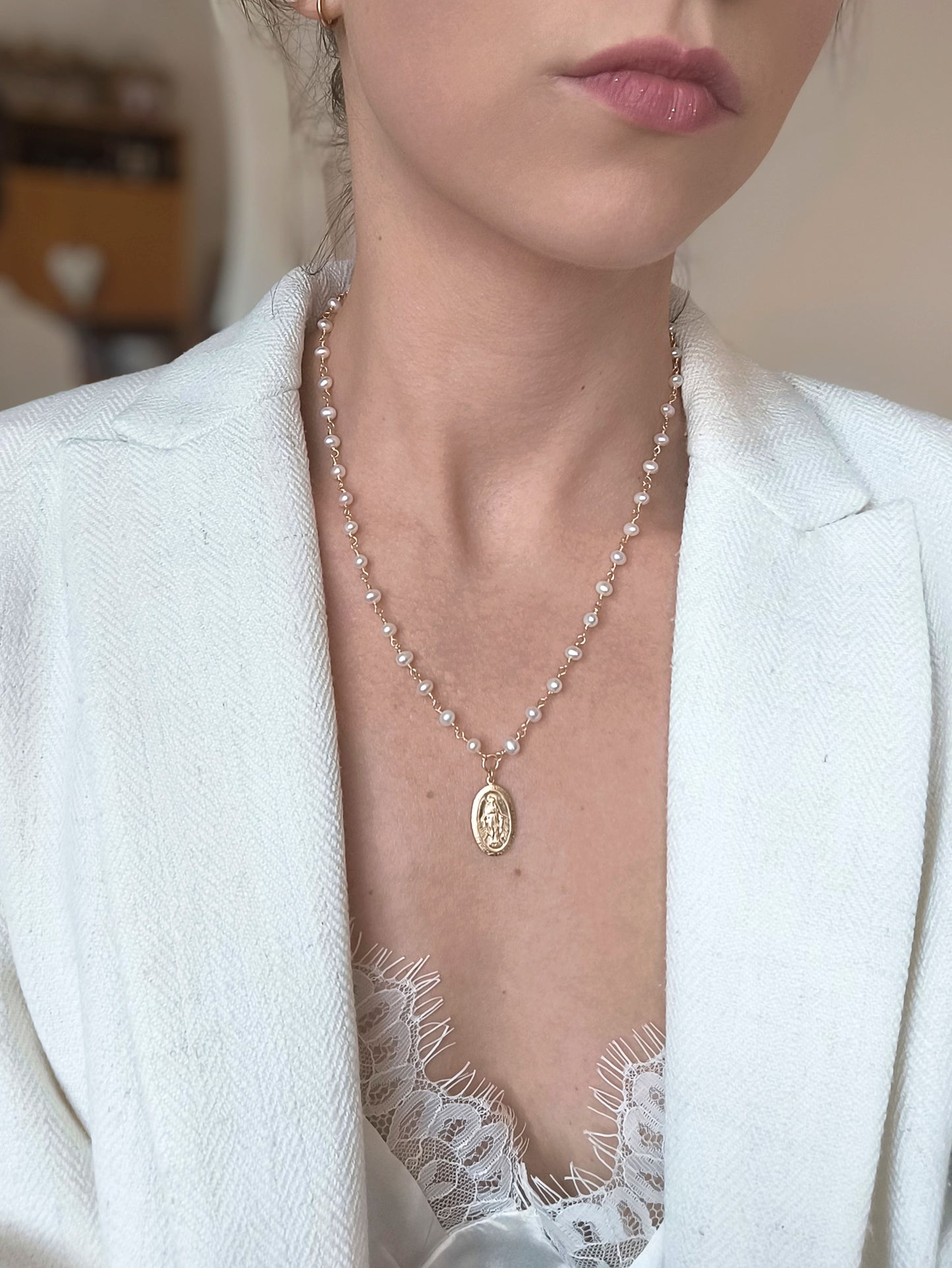 Perlenkette mit Madonna