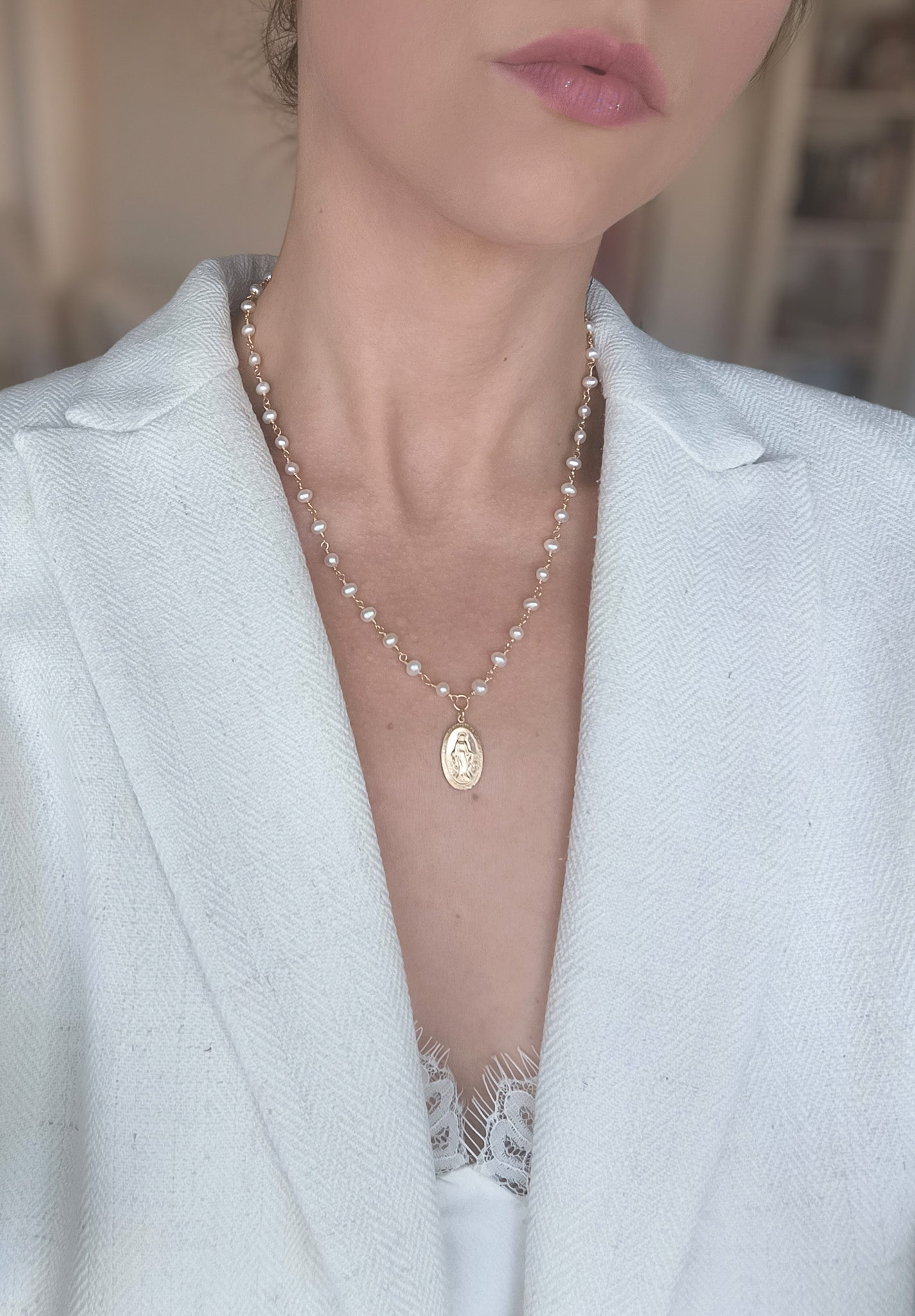 Perlenkette mit Madonna