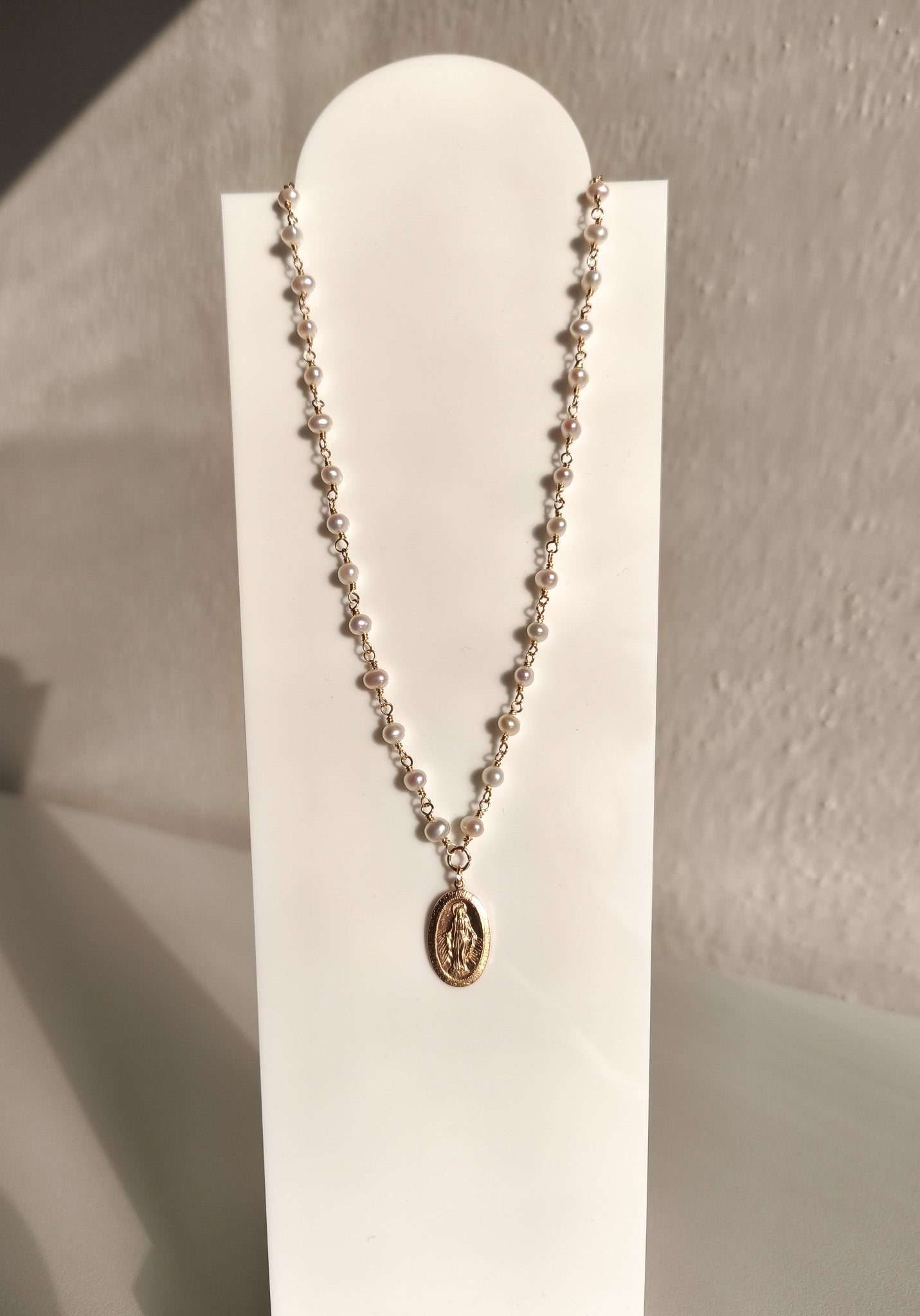 Perlenkette mit Madonna