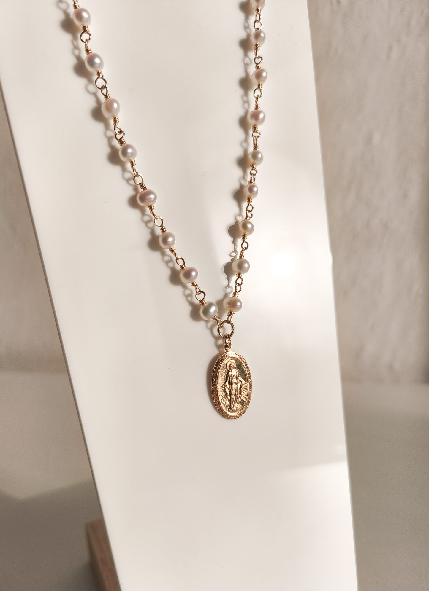 Perlenkette mit Madonna