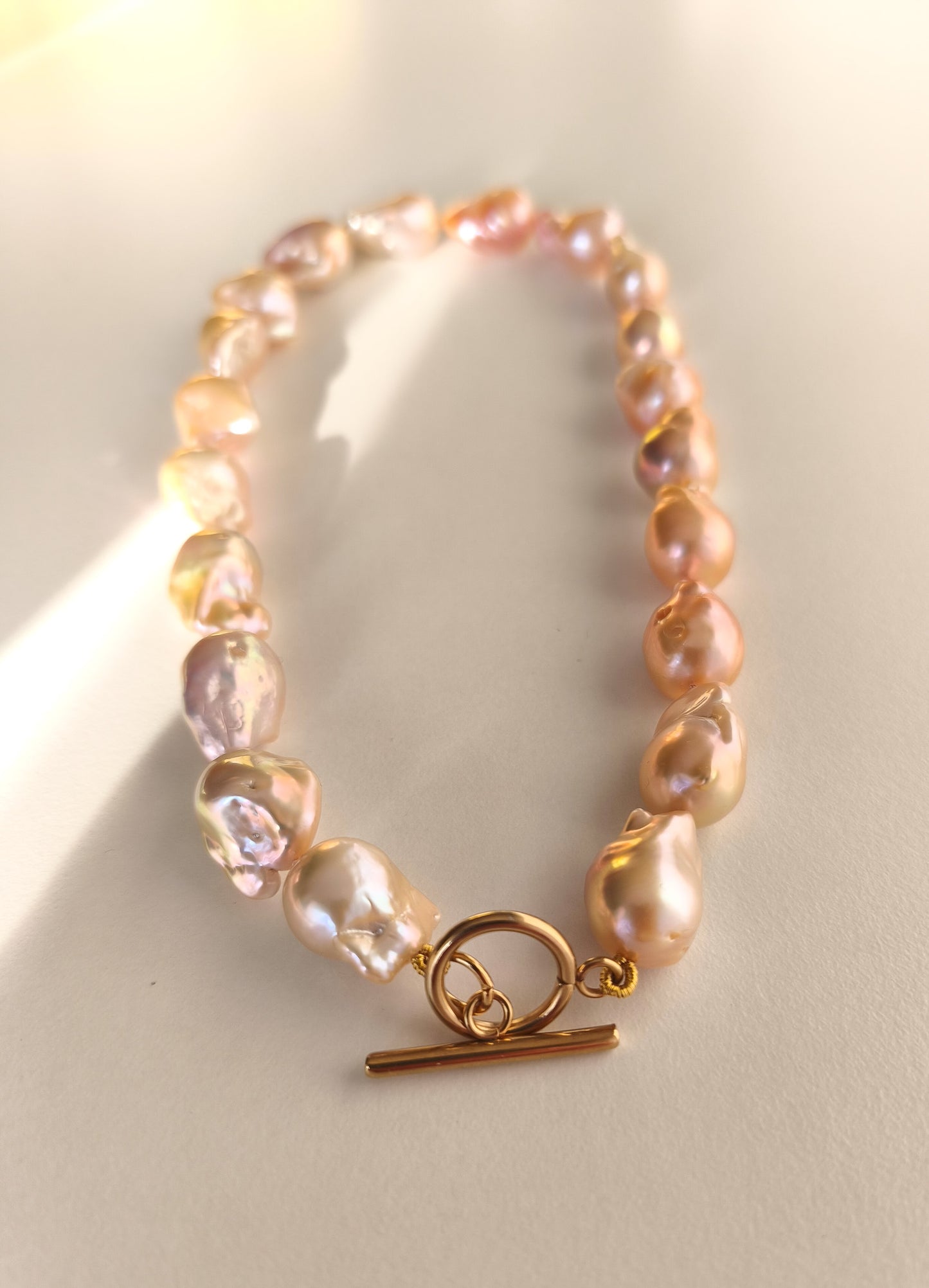 Peach pink flameball pearl necklace