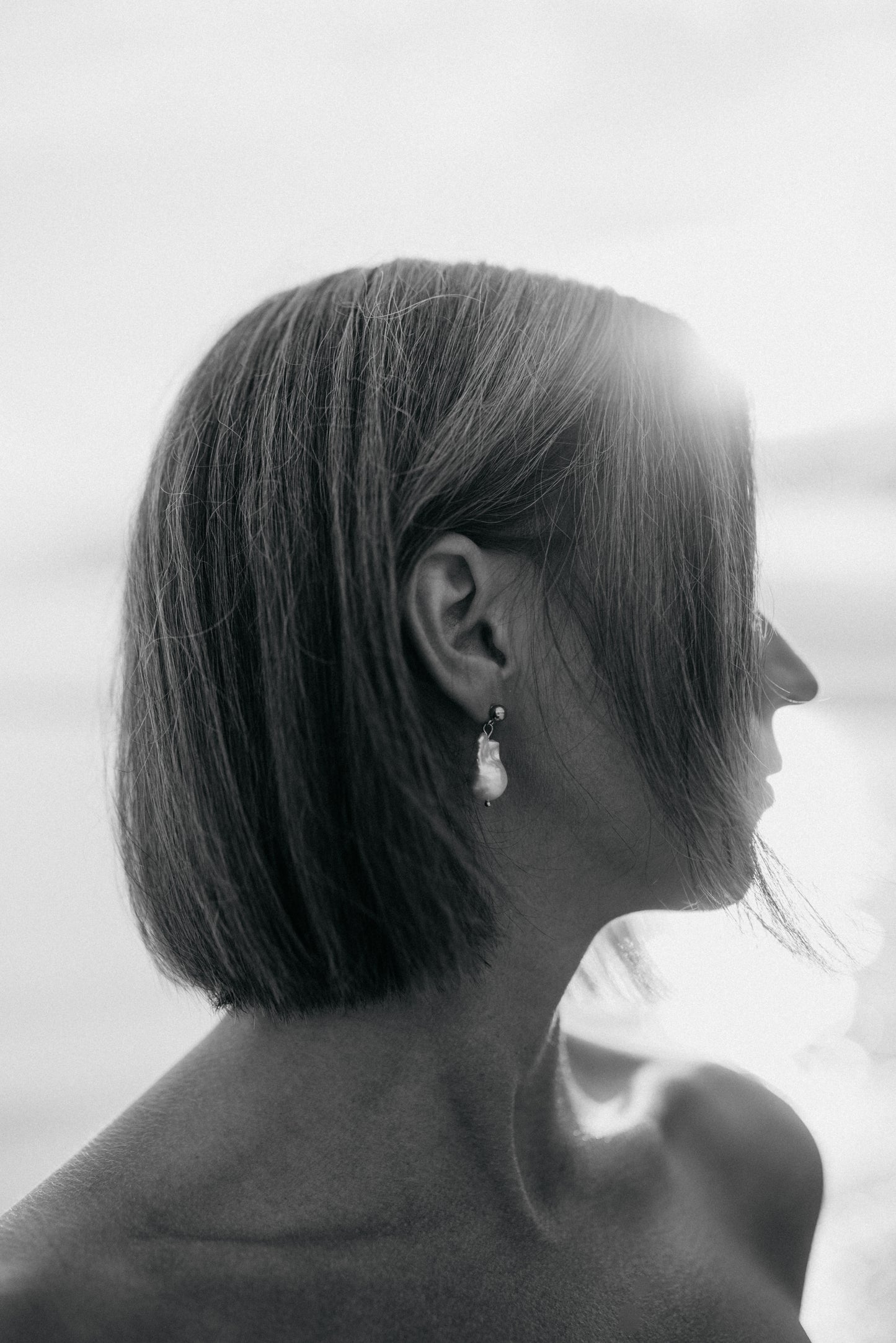 Flameball pearl drop earrings