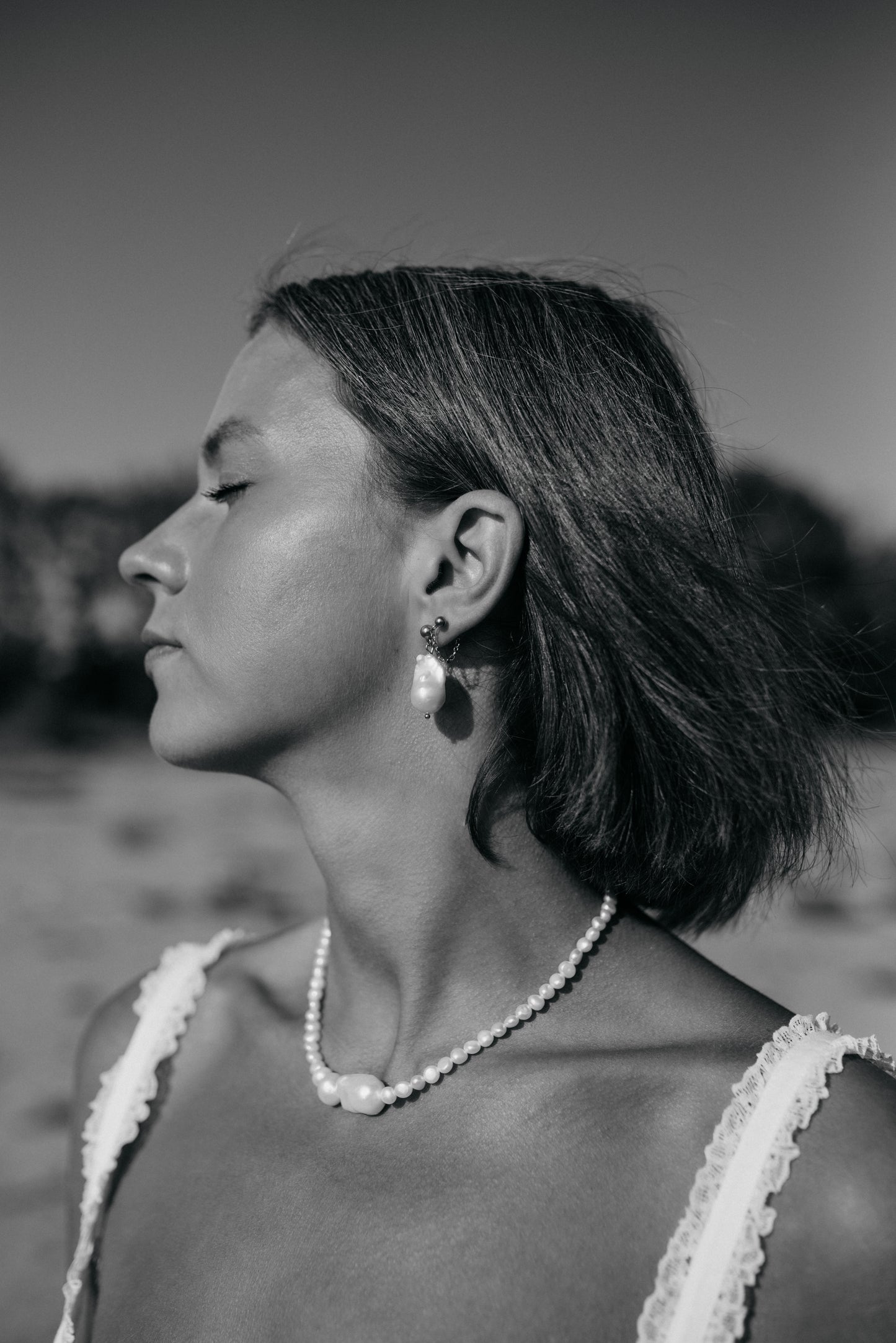 Flameball pearl drop earrings