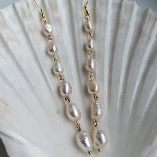 Extra long pearl earrings