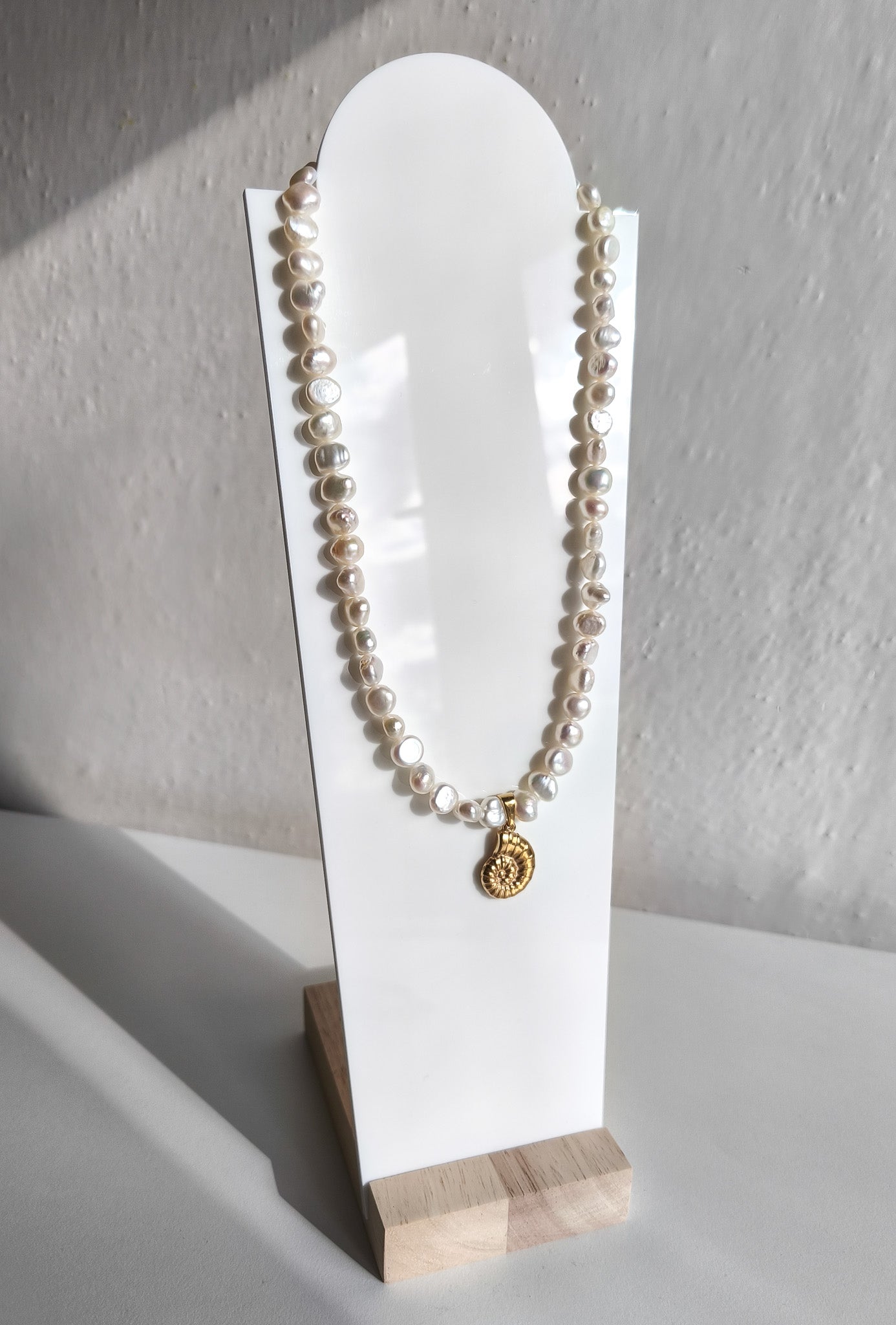 Gold seashell necklace