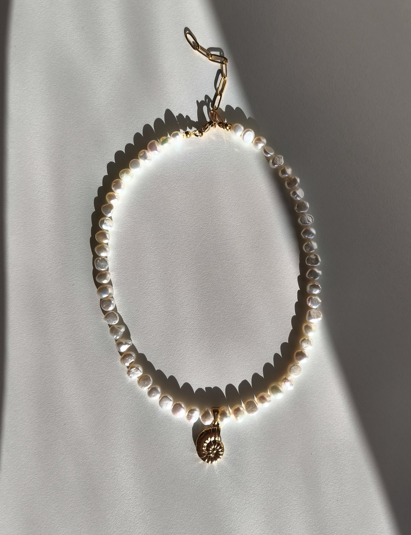Gold seashell necklace