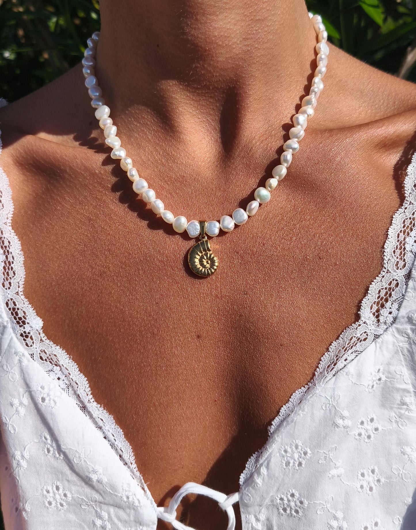 Gold seashell necklace