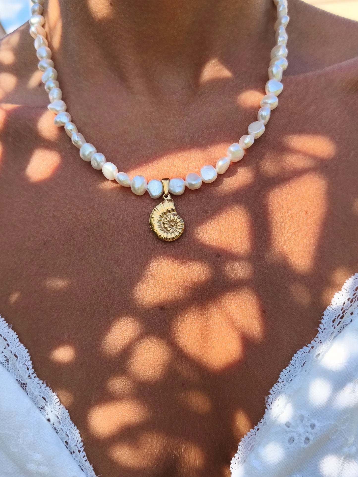 Gold seashell necklace