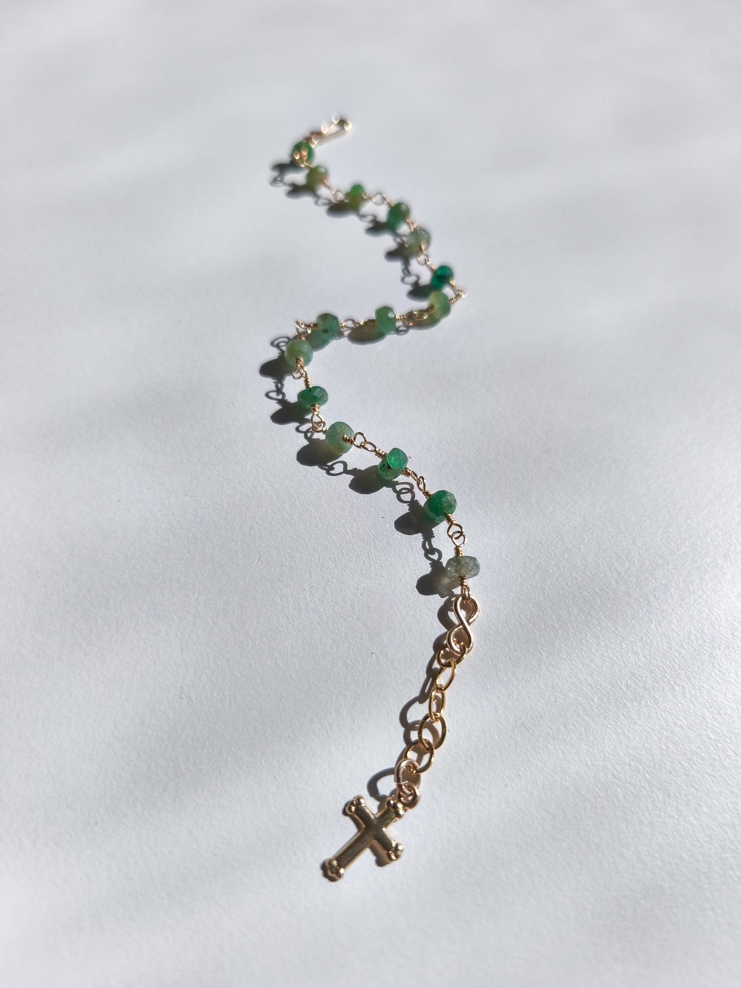 Emerald cross charm bracelet