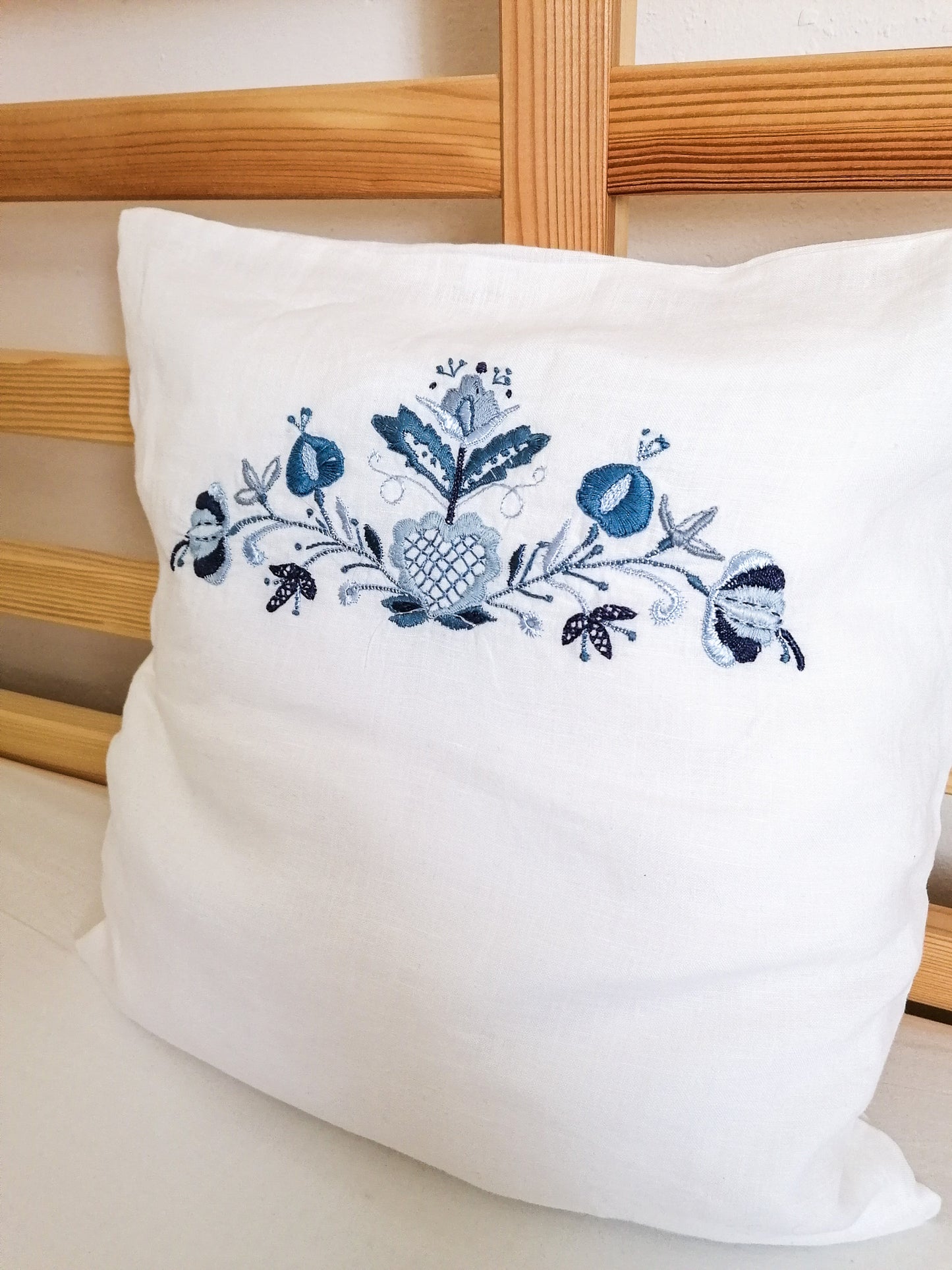 Embroidered blue folk pillowcase