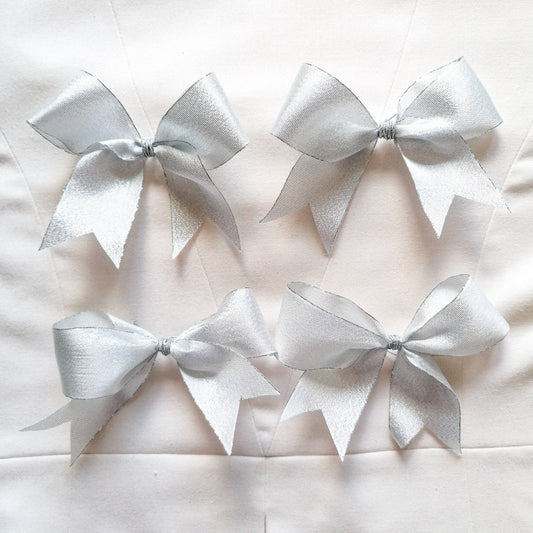 Silver bow ornaments
