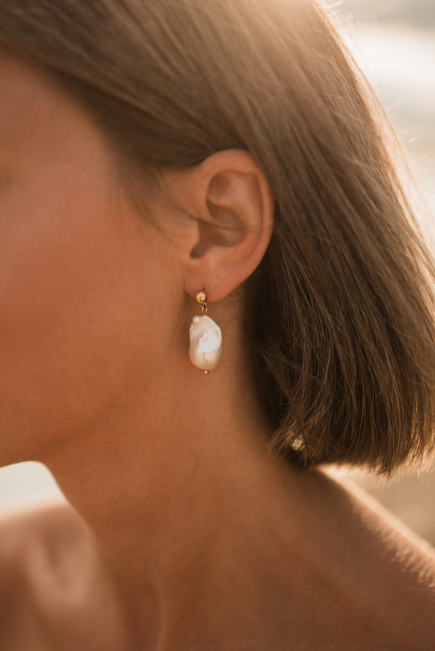 Flameball pearl drop earrings