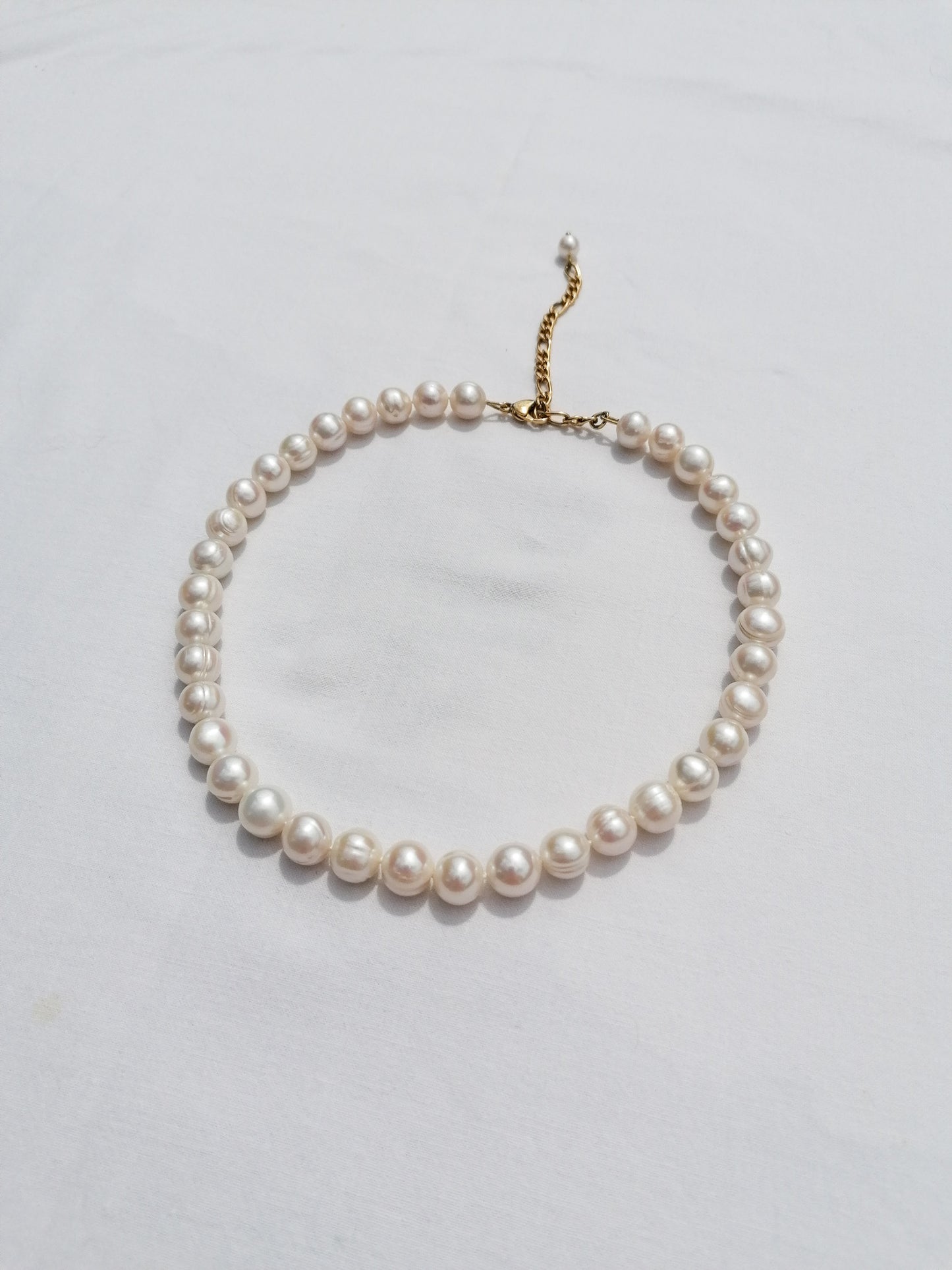 Large round pearl necklace