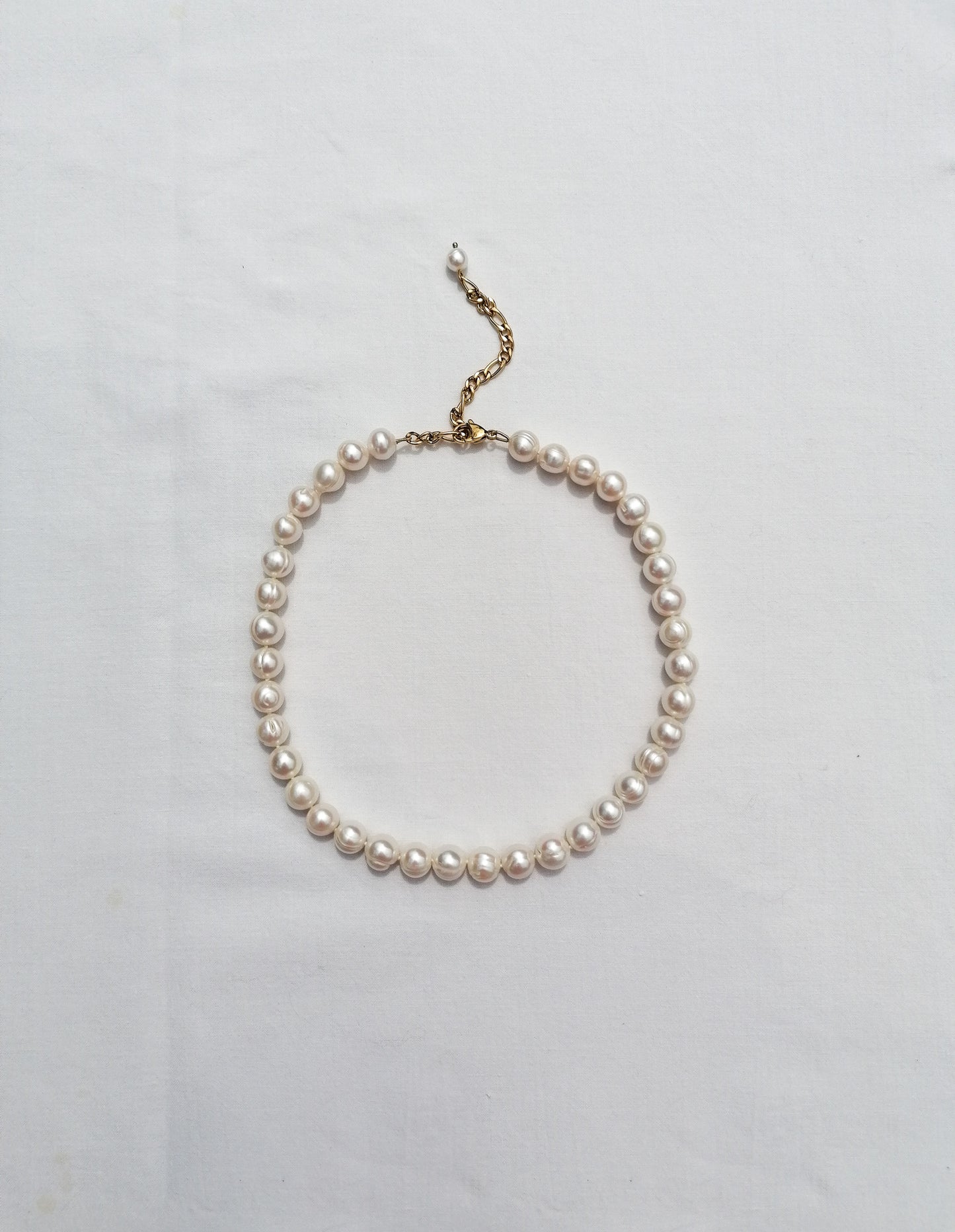 Large round pearl necklace