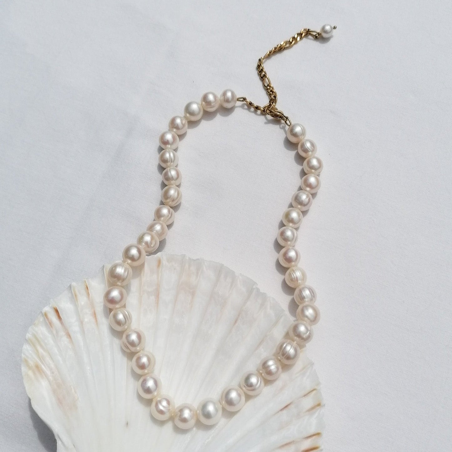 Large round pearl necklace