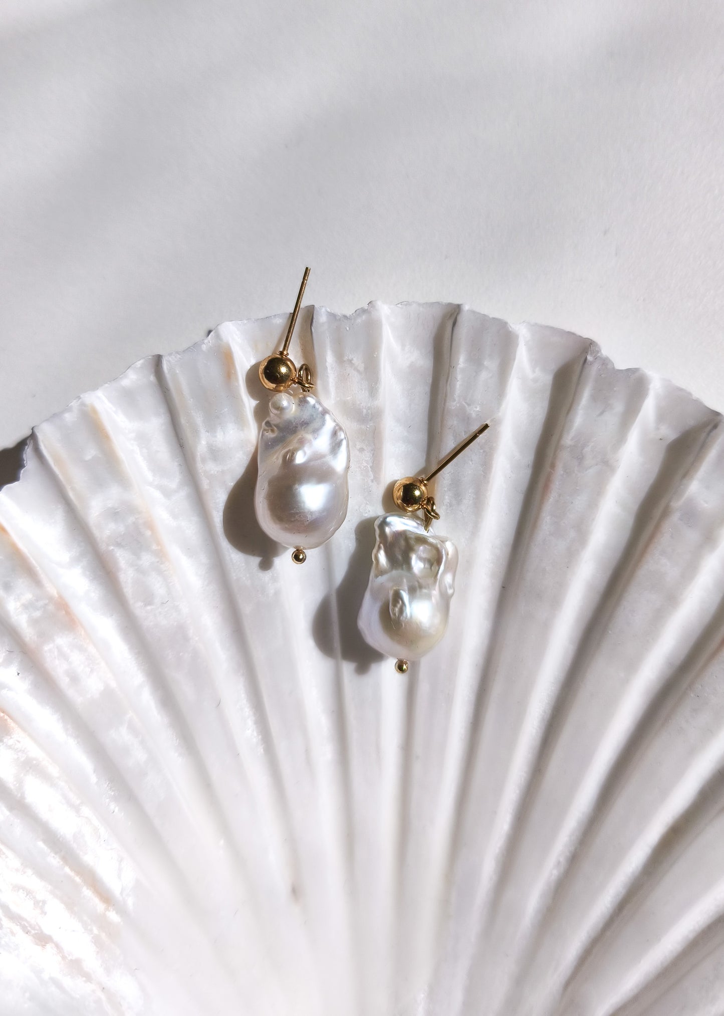 Flameball pearl drop earrings