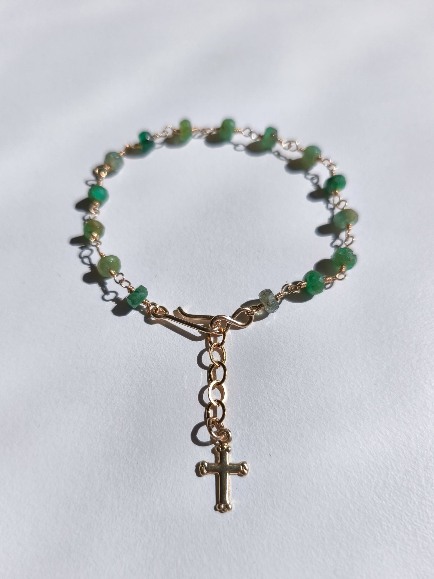 Emerald cross charm bracelet