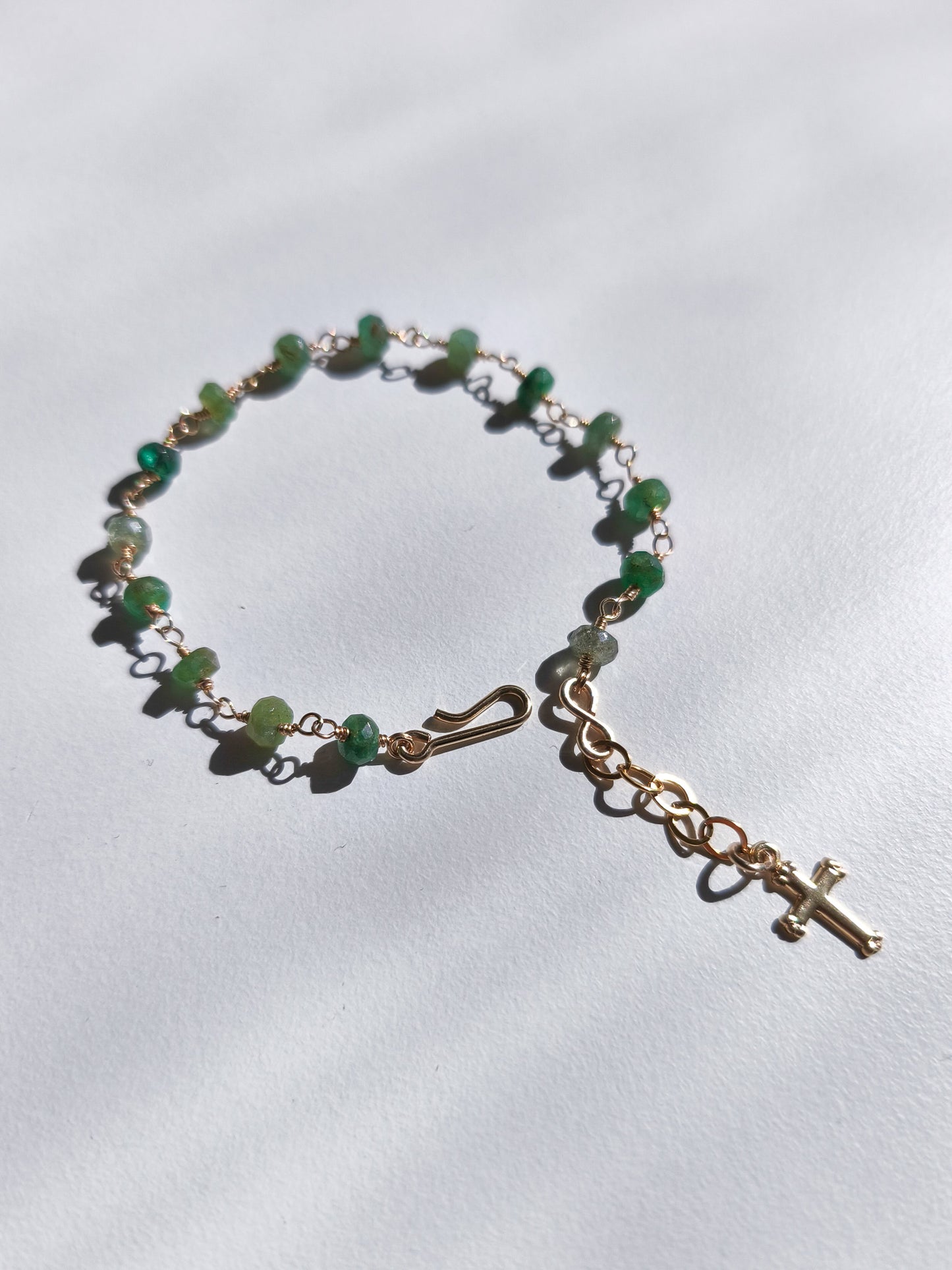Emerald cross charm bracelet