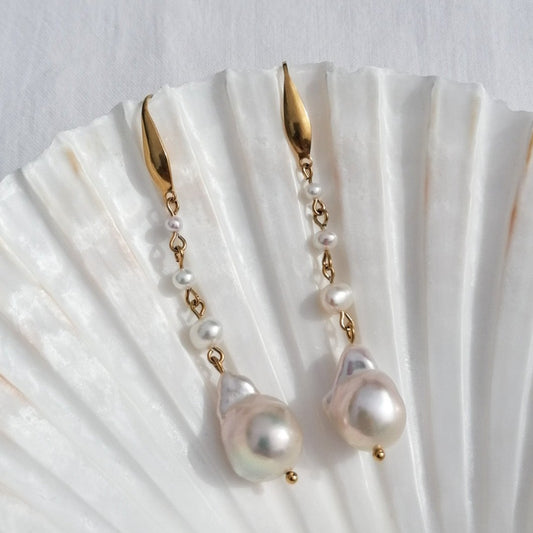 Long baroque pearl earrings