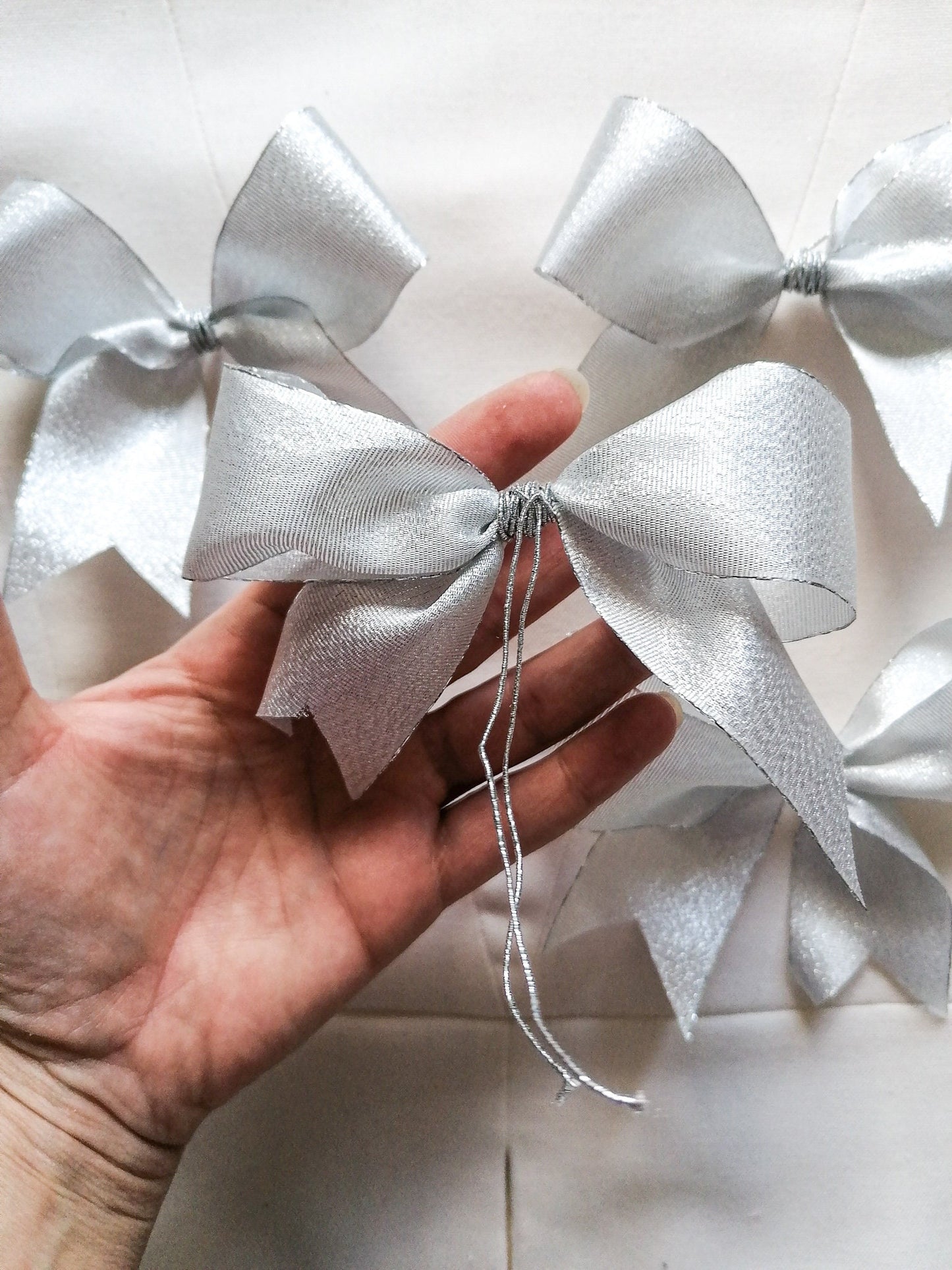 Silver bow ornaments