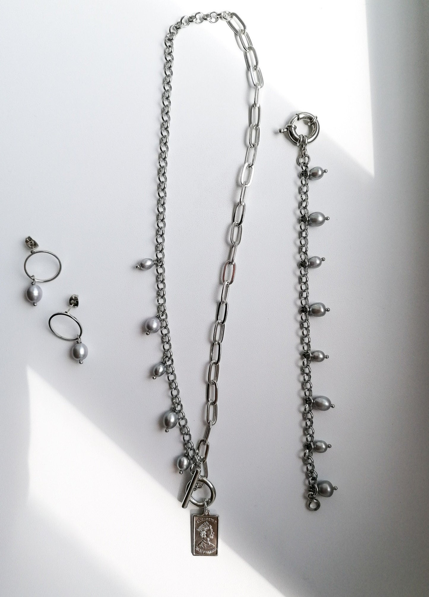 Gray pearl charm bracelet